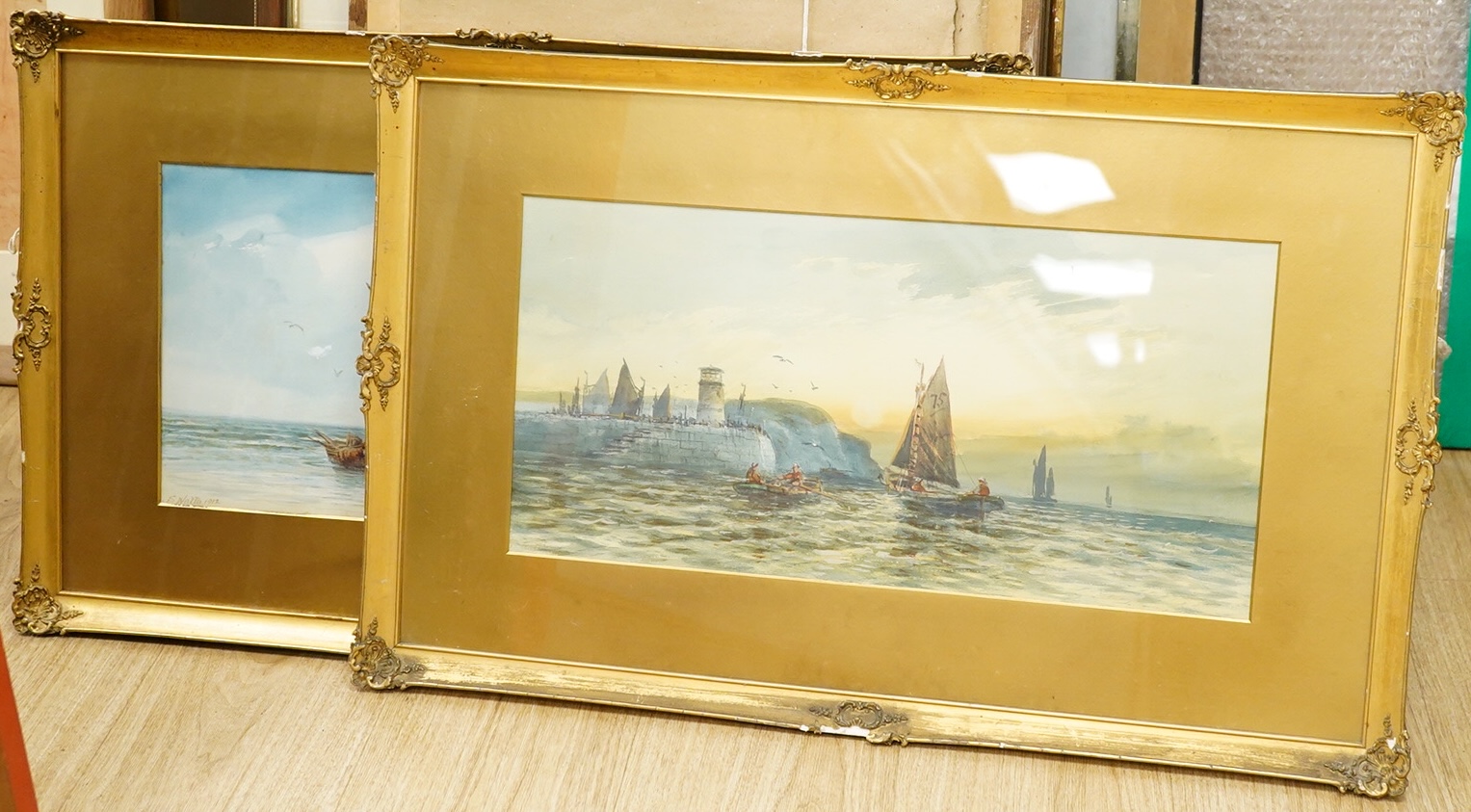 S. Watts, Fishing boats, one signed and dated 1912, pair of watercolours, gilt framed, 25 x 50cm